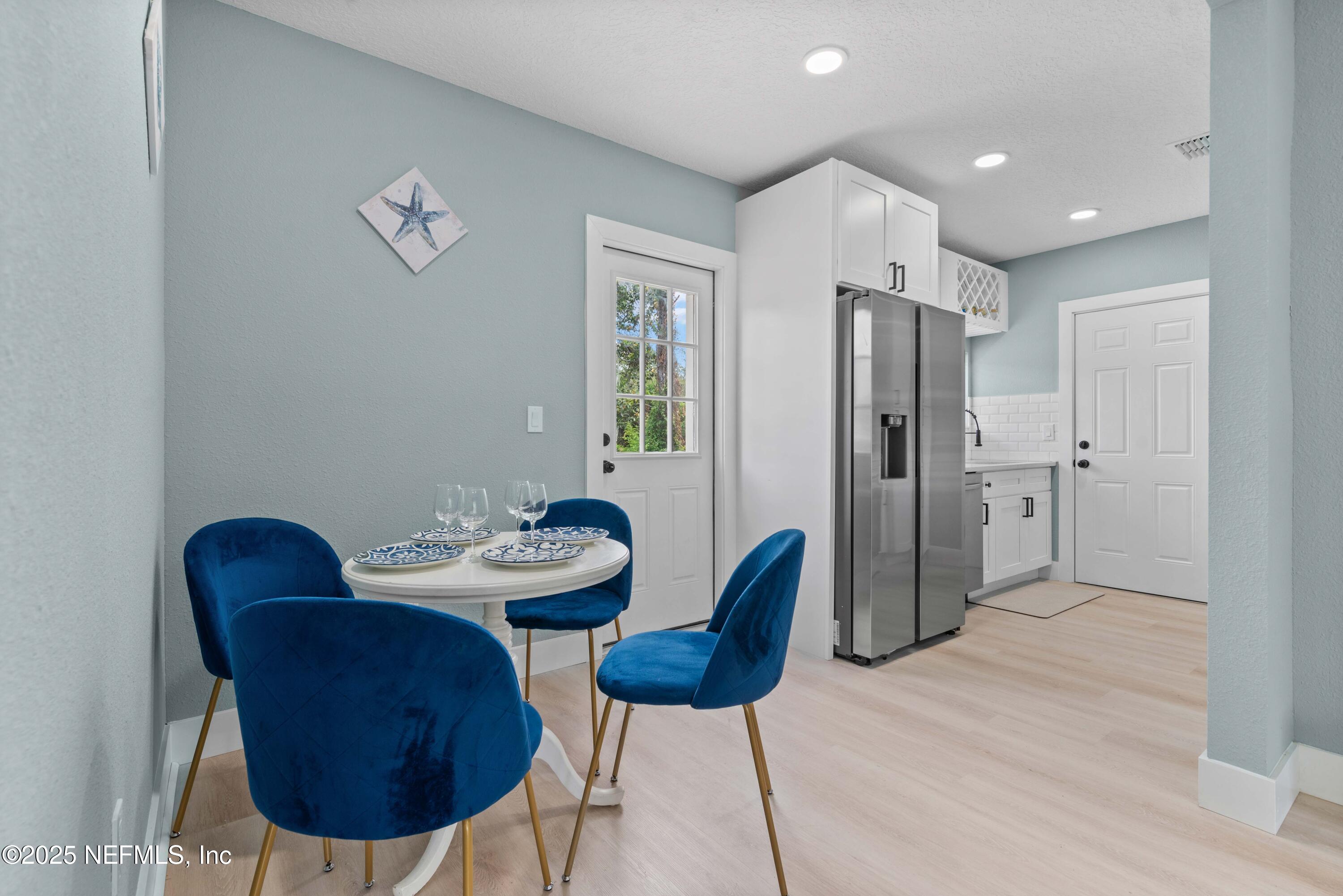 4647 Timuquana Road Jacksonville, FL 32210 - Photo 10 of 27 a view of a dining room with furniture
