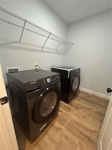 a utility room with dryer and washer
