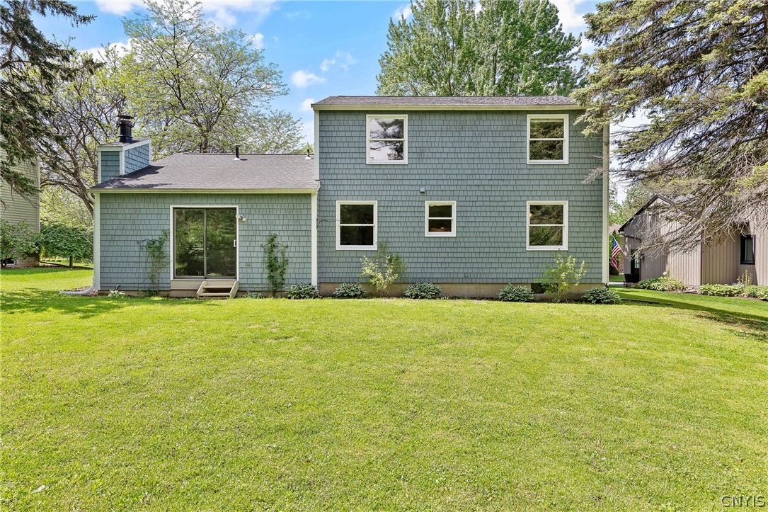 8841 Wandering Way Lysander, NY 13027 - Photo 35 of 42 Beautiful cedar siding brings a classic & architectural feel.