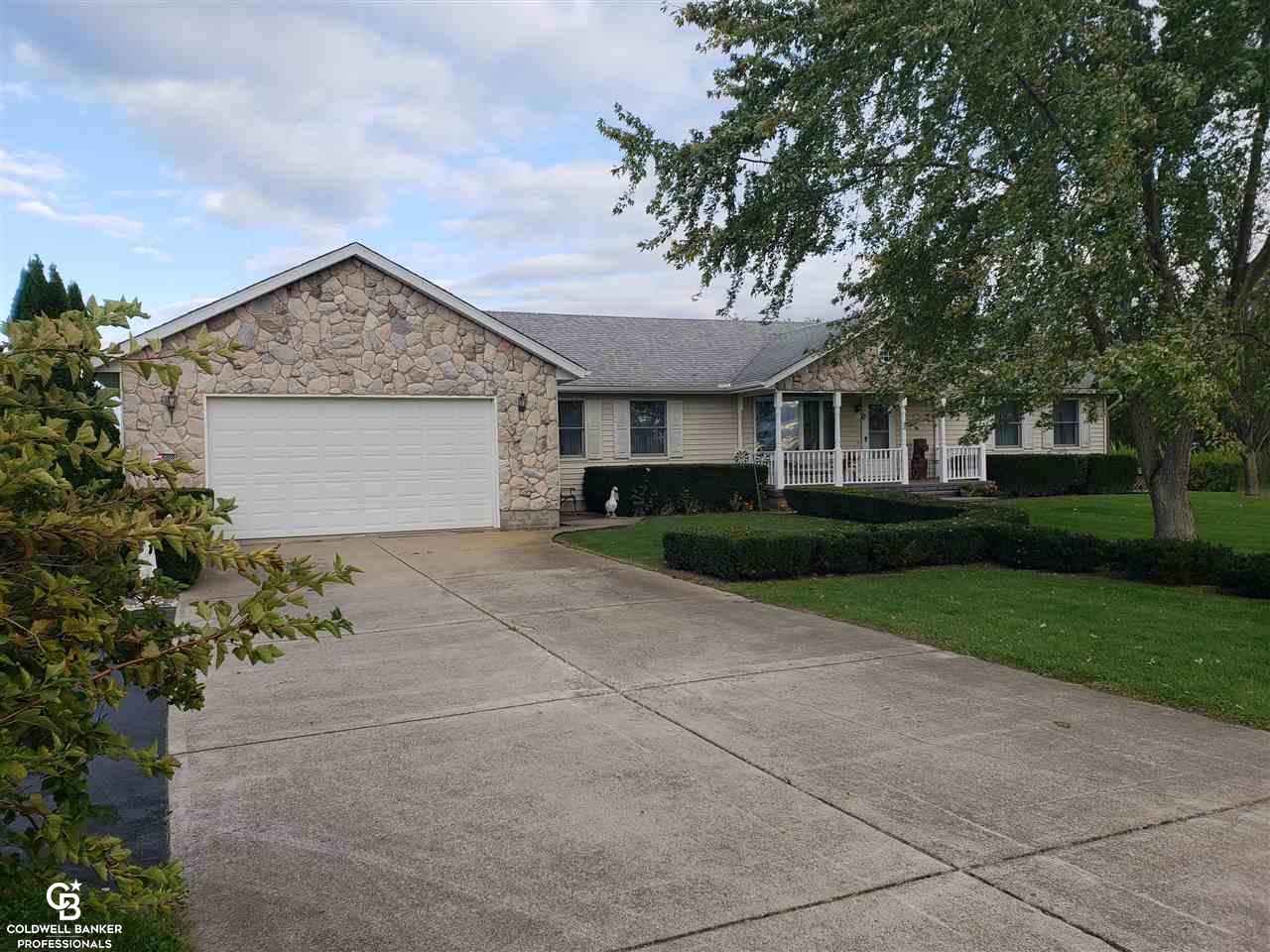5610 Capac Road Capac, MI 48014 - Photo 12 of 28 This is another view of the front of the home.