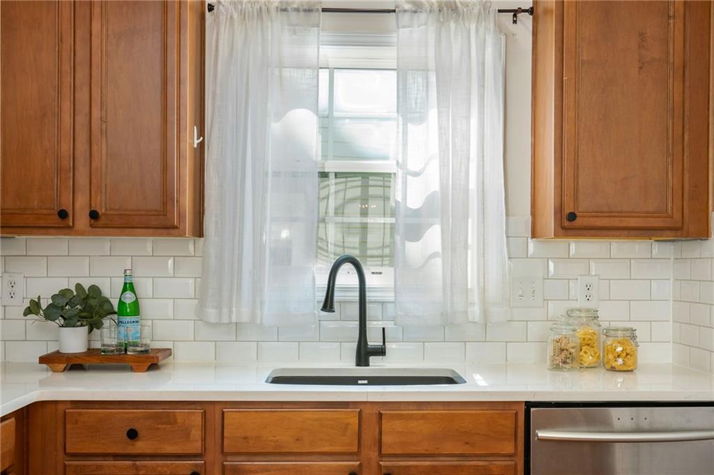 4150 Lake Pass Lane Suwanee, GA 30024 - Photo 19 of 46 a bathroom with a sink and a mirror