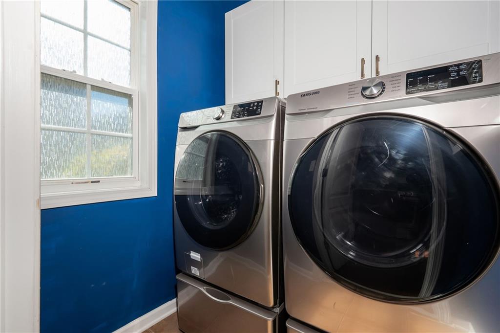 4150 Lake Pass Lane Suwanee, GA 30024 - Photo 24 of 46 a close up view of washer and dryer