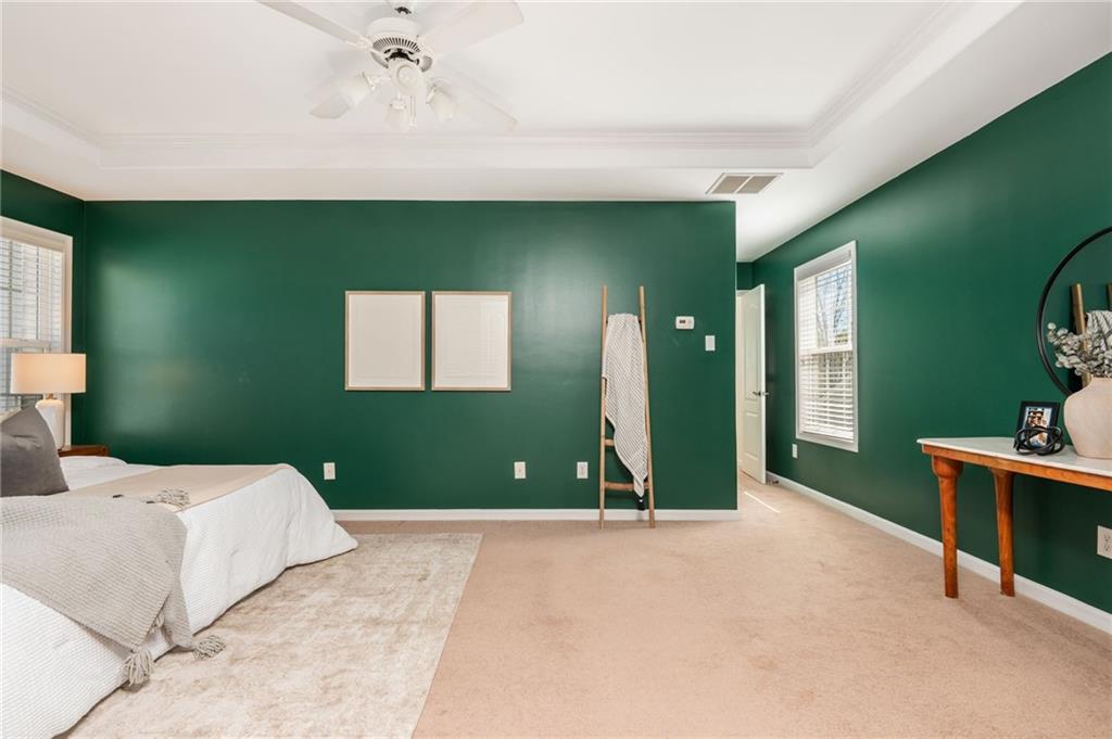 4150 Lake Pass Lane Suwanee, GA 30024 - Photo 26 of 46 a bedroom with a bed and a large window