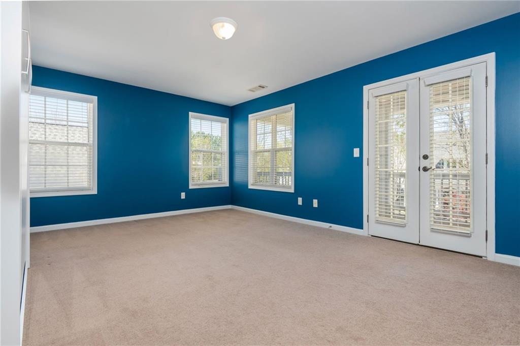 4150 Lake Pass Lane Suwanee, GA 30024 - Photo 37 of 46 a view of an empty room with a window