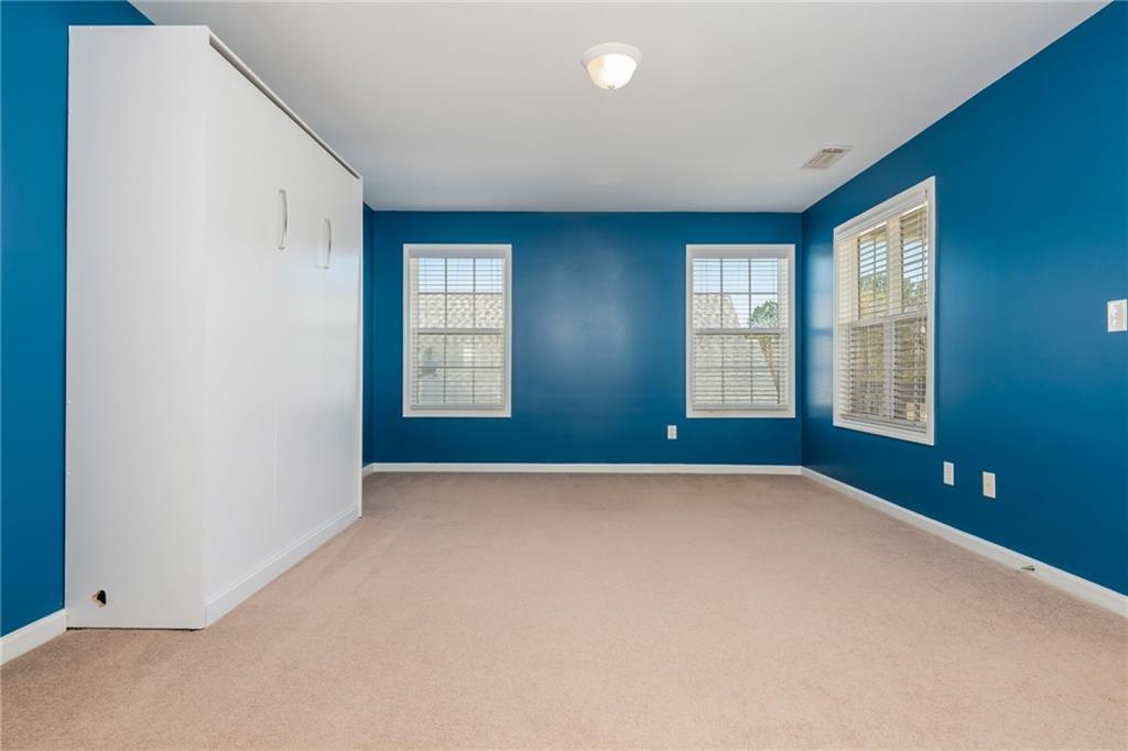 4150 Lake Pass Lane Suwanee, GA 30024 - Photo 38 of 46 a view of an empty room with a window