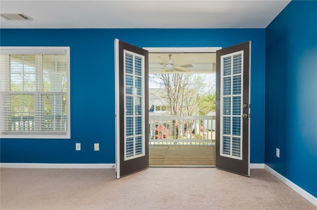 4150 Lake Pass Lane Suwanee, GA 30024 - Photo 39 of 46 a view of an empty room with a window