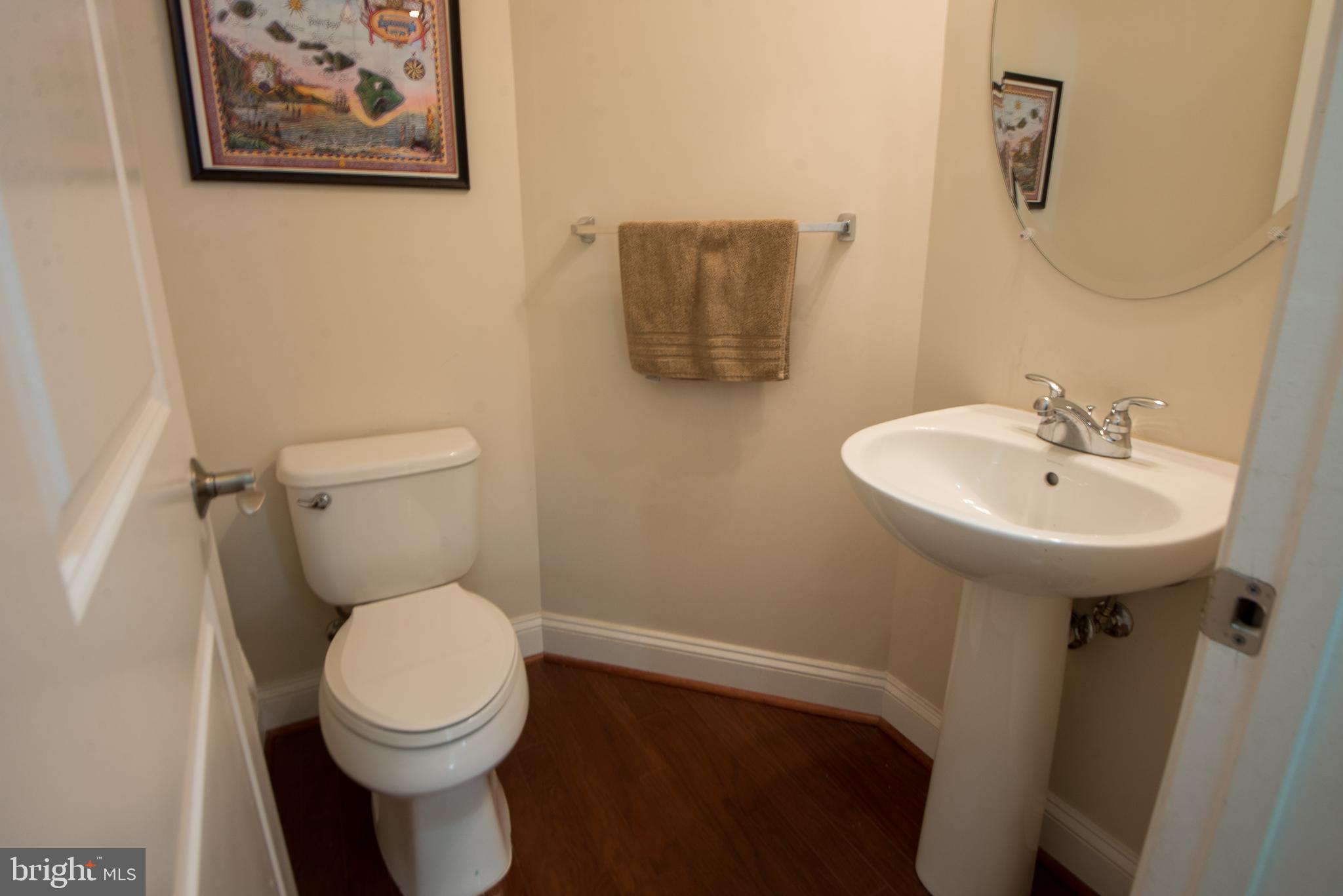 8 Meridian Lane Towson, MD 21286 - Photo 14 of 39 a bathroom with a toilet sink and mirror