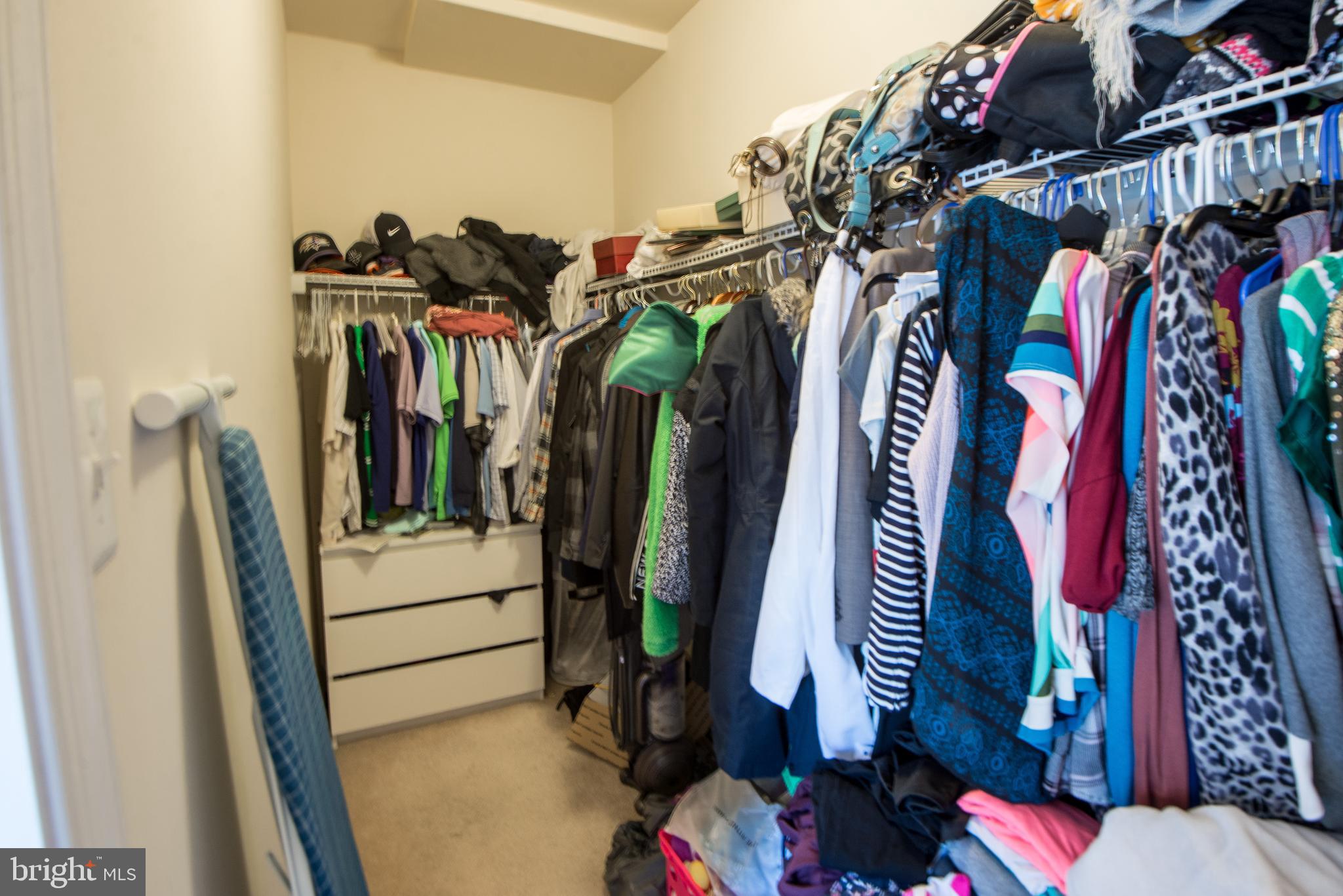 8 Meridian Lane Towson, MD 21286 - Photo 20 of 39 a view of walk in closet with clothes and shoes
