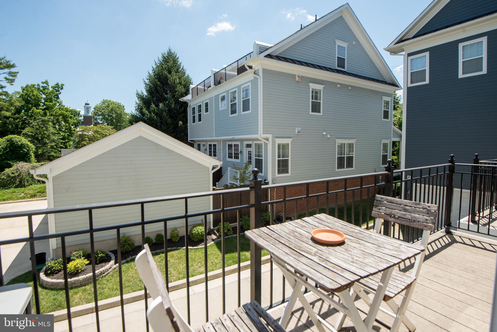 8 Meridian Lane Towson, MD 21286 - Photo 7 of 39 a terrace of a house with wooden floor and outdoor seating
