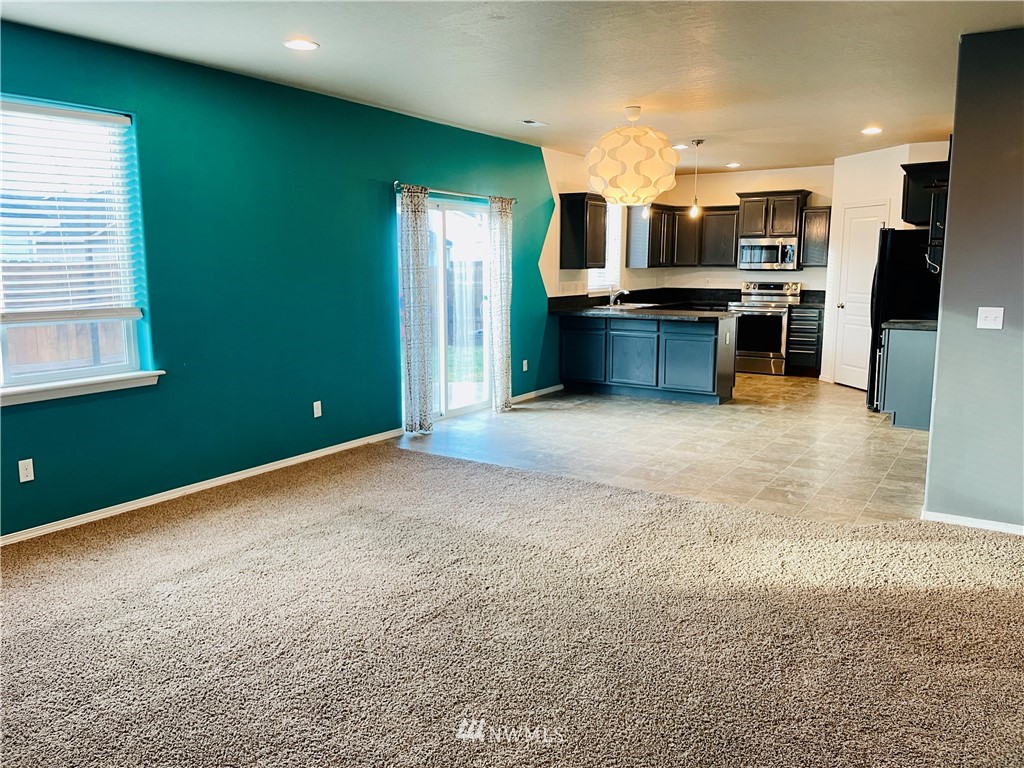 1924 Stevens Street Walla Walla, WA 99362 - Photo 12 of 24 a view of kitchen with kitchen island and stainless steel appliances