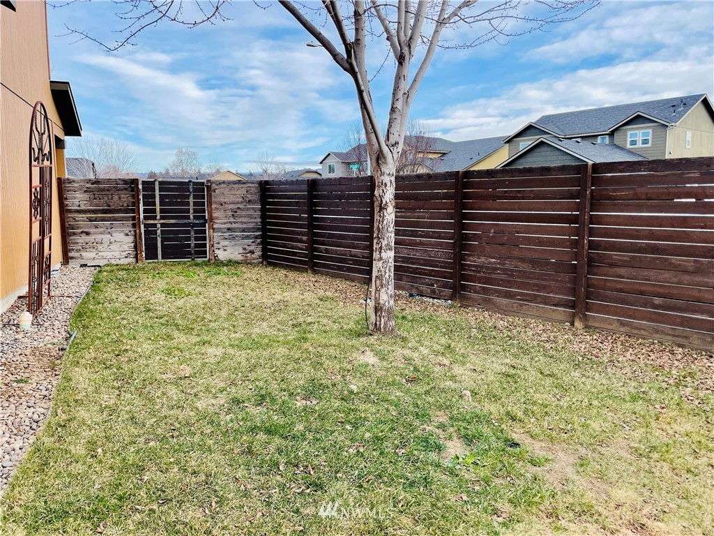 1924 Stevens Street Walla Walla, WA 99362 - Photo 22 of 24 a view of house with a tree in the background