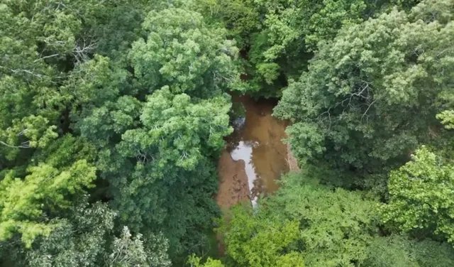 a view of a lake with a house
