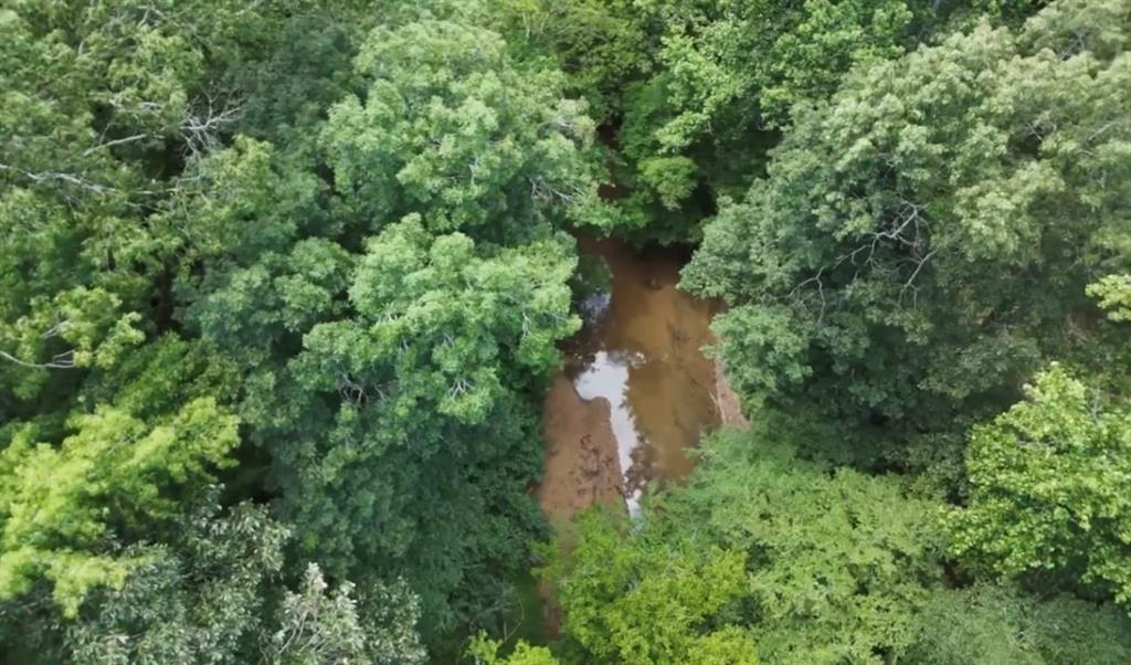 0 Culpepper Road Northeast Calhoun, GA 30701 - Photo 3 of 9 a view of a lake with a house
