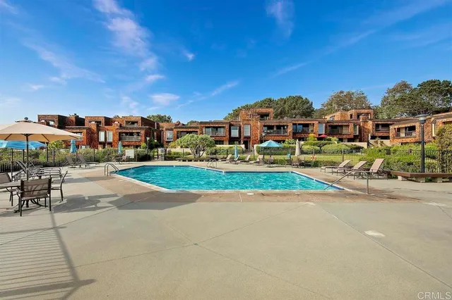 a view of a tree with a yard