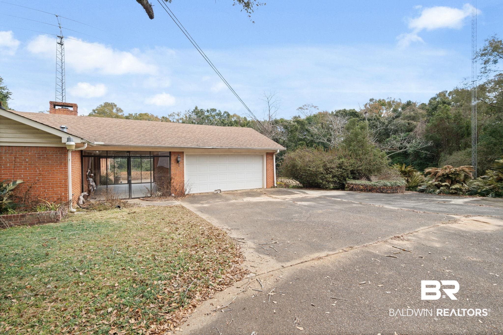 6261 Old Pascagoula Road Theodore, AL 36582 - Photo 7 of 29 View of home's exterior with a garage