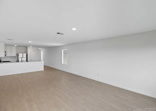 a view of a kitchen with a sink and a view of kitchen
