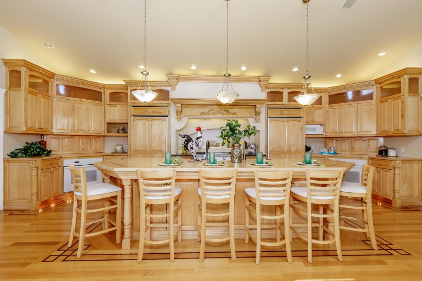 20585 Scofield Drive Cupertino, CA 95014 - Photo 14 of 32 a dining table with chairs and kitchen view