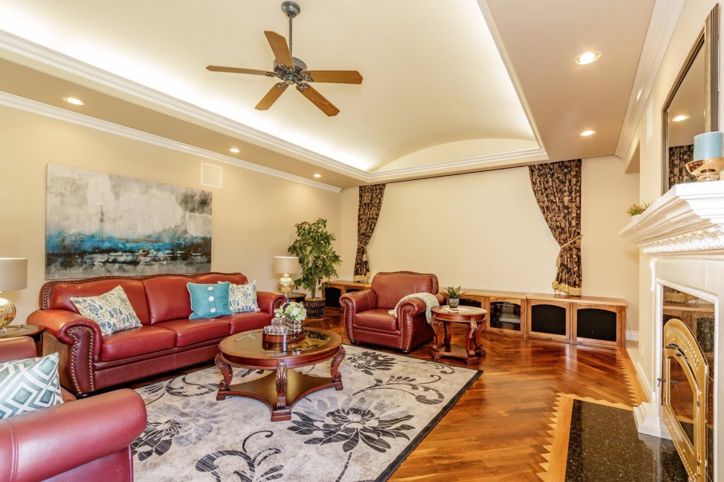 20585 Scofield Drive Cupertino, CA 95014 - Photo 18 of 32 a living room with furniture ceiling fan and a rug