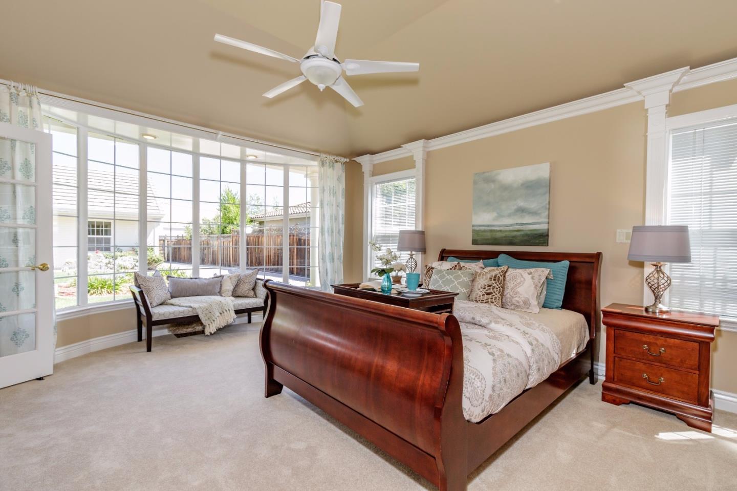 20585 Scofield Drive Cupertino, CA 95014 - Photo 21 of 32 a bedroom with a bed and a large window