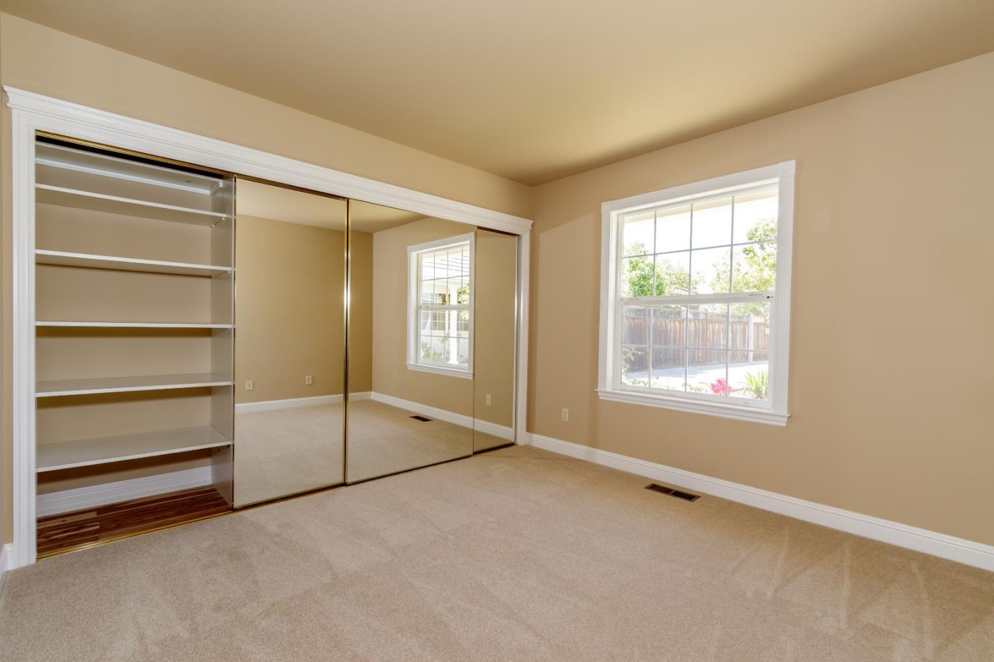 20585 Scofield Drive Cupertino, CA 95014 - Photo 28 of 32 a view of an empty room with a window