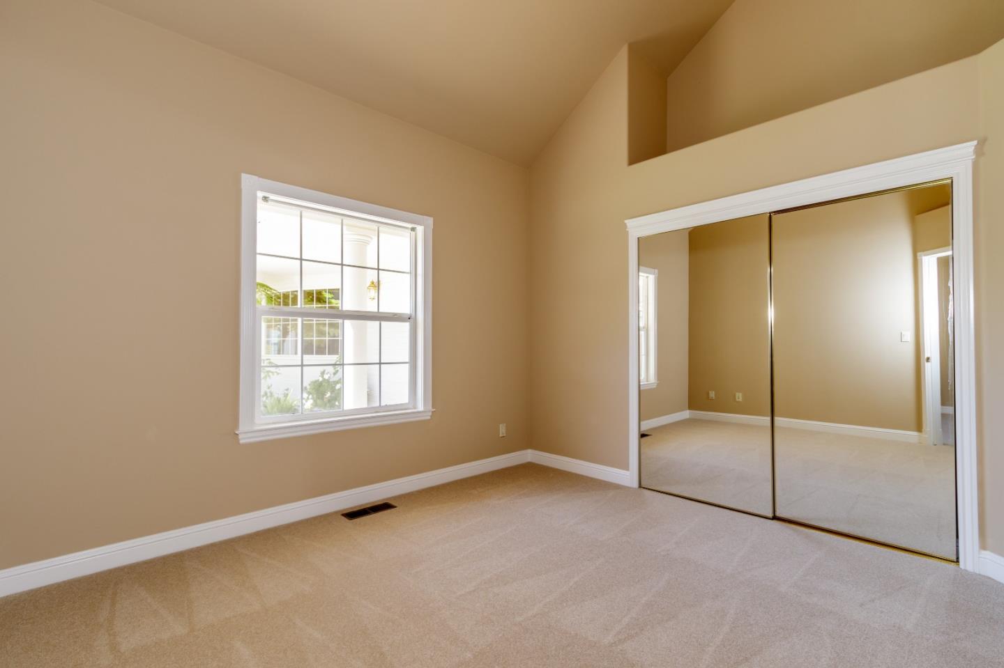 20585 Scofield Drive Cupertino, CA 95014 - Photo 29 of 32 an empty room with windows and closet