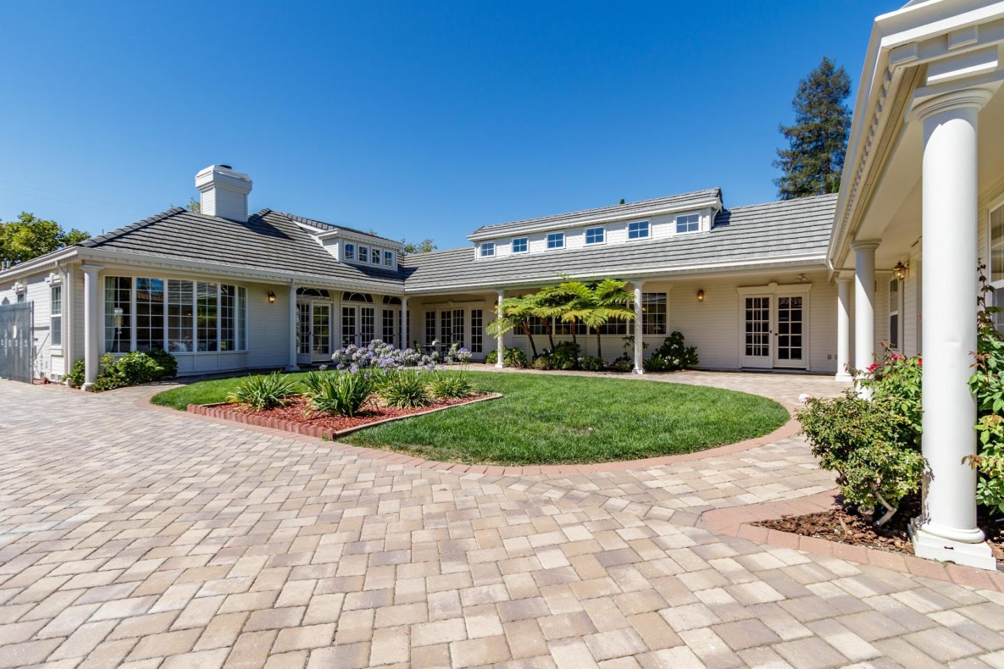 20585 Scofield Drive Cupertino, CA 95014 - Photo 31 of 32 a front view of a house with garden