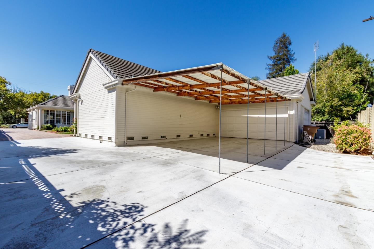 20585 Scofield Drive Cupertino, CA 95014 - Photo 32 of 32 a view of a house with a garage