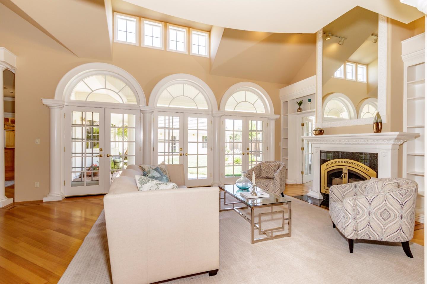 20585 Scofield Drive Cupertino, CA 95014 - Photo 6 of 32 a living room with furniture and a fireplace