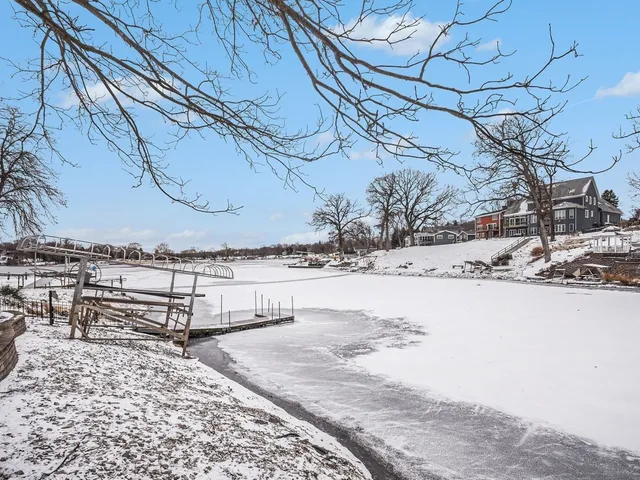 a view of a backyard of the house