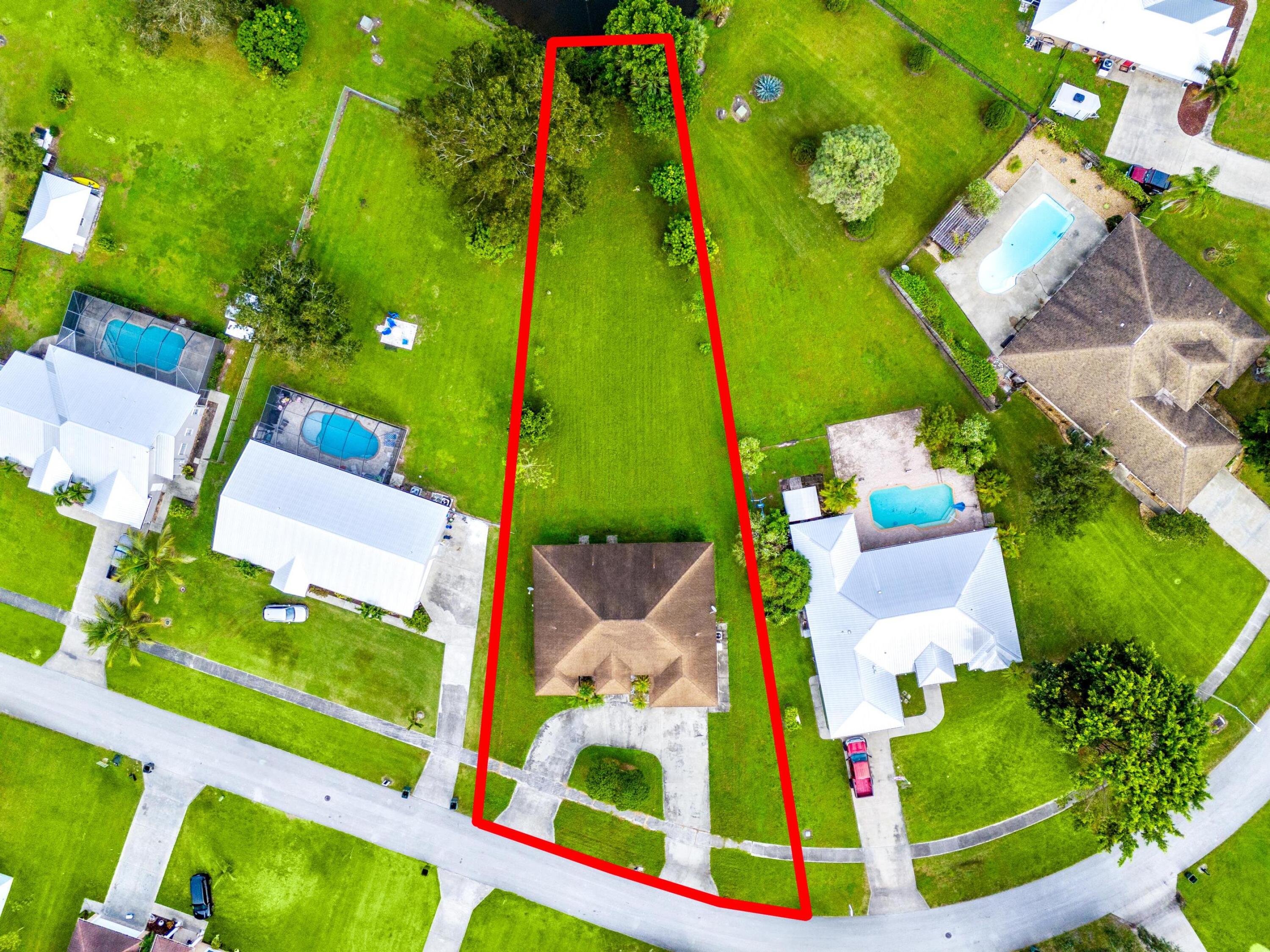 907 Sawgrass Street Clewiston, FL 33440 - Photo 20 of 60 an aerial view of a house