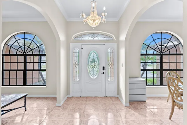 a bathroom with a granite countertop bathtub shower sink and mirror