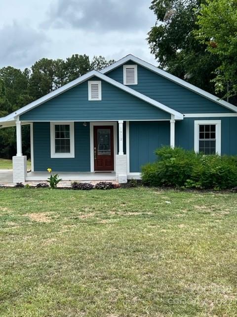 1912 Flat Creek Road Lancaster, SC 29720 - Photo 5 of 29 a front view of house with yard and green space