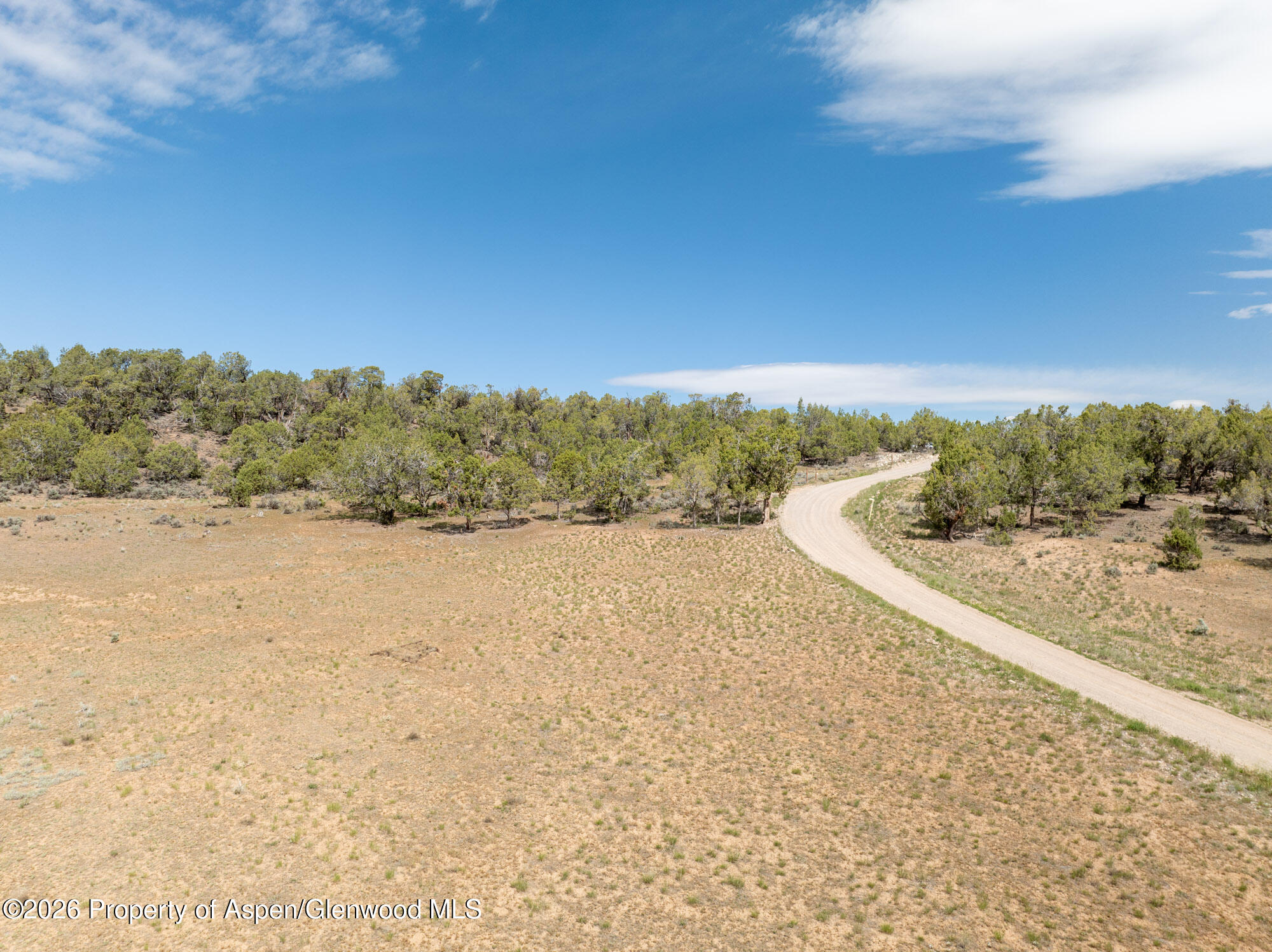 Tbd North Cedar Springs Ranch Road Rifle, CO 81650 - Photo 13 of 13 a view of a field with an ocean
