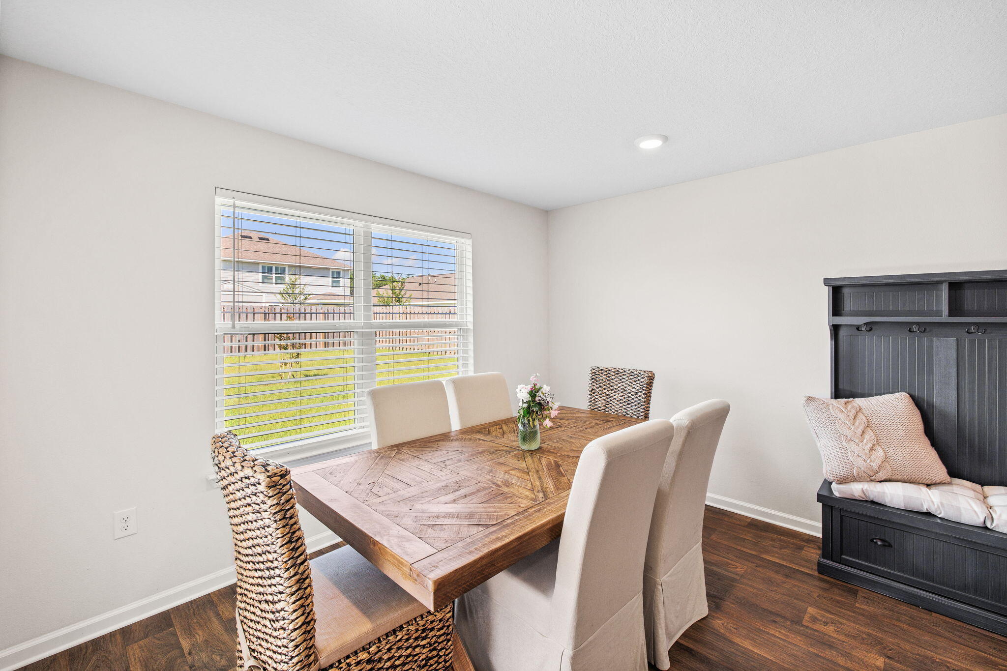 245 This Way Freeport, FL 32439 - Photo 15 of 46 a view of a dining room with furniture and wooden floor