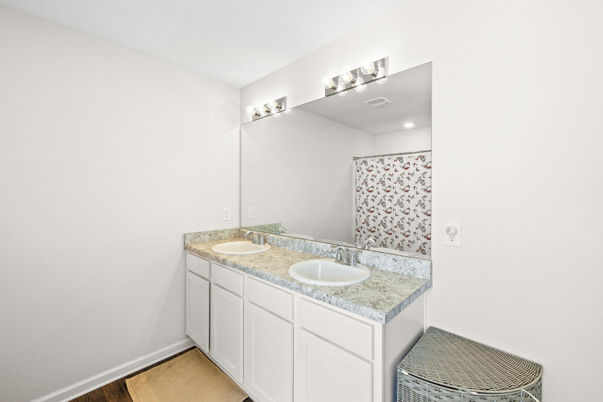 245 This Way Freeport, FL 32439 - Photo 22 of 46 a bathroom with a granite countertop sink and a mirror