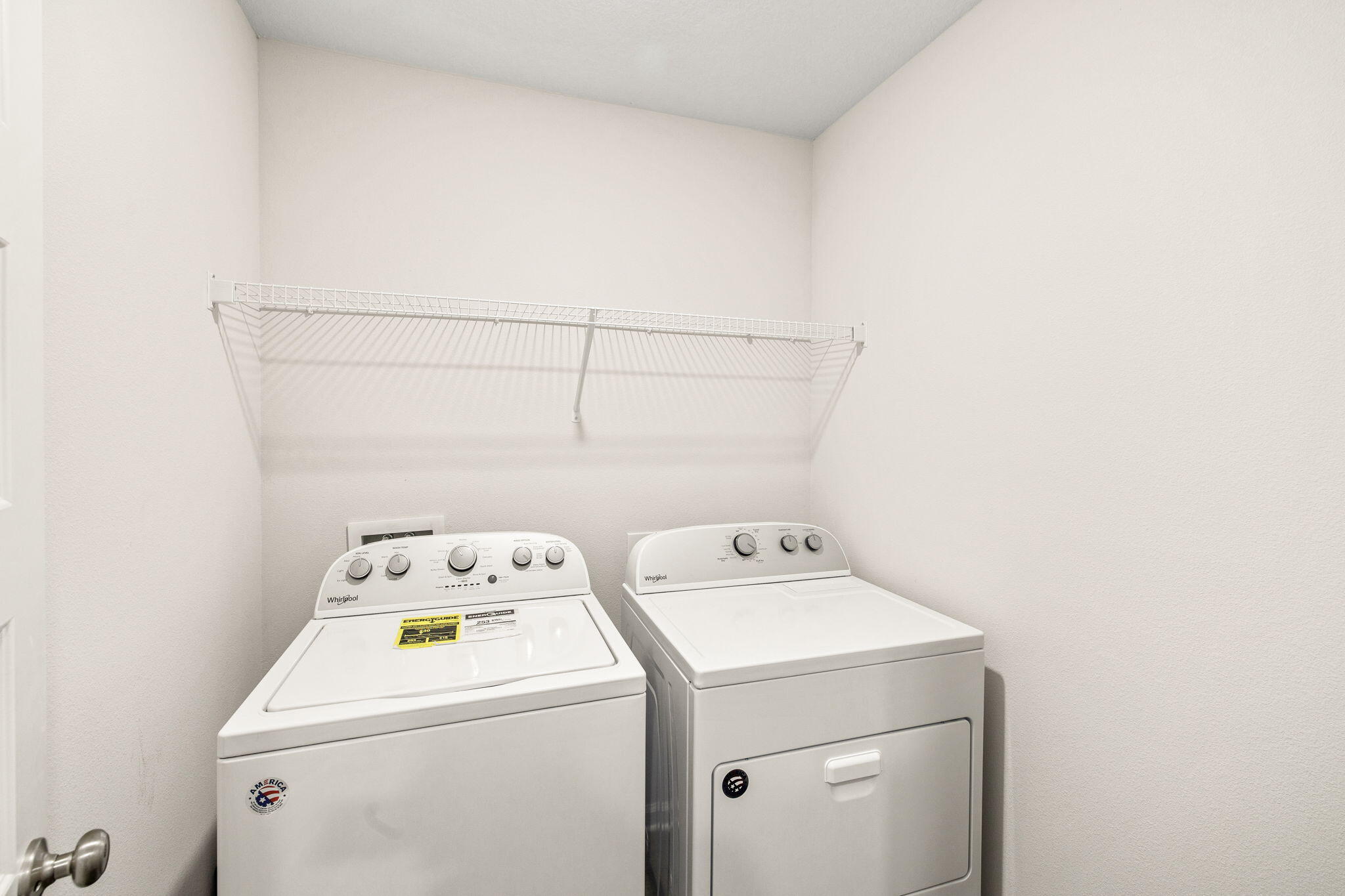 245 This Way Freeport, FL 32439 - Photo 29 of 46 a utility room with dryer and washer