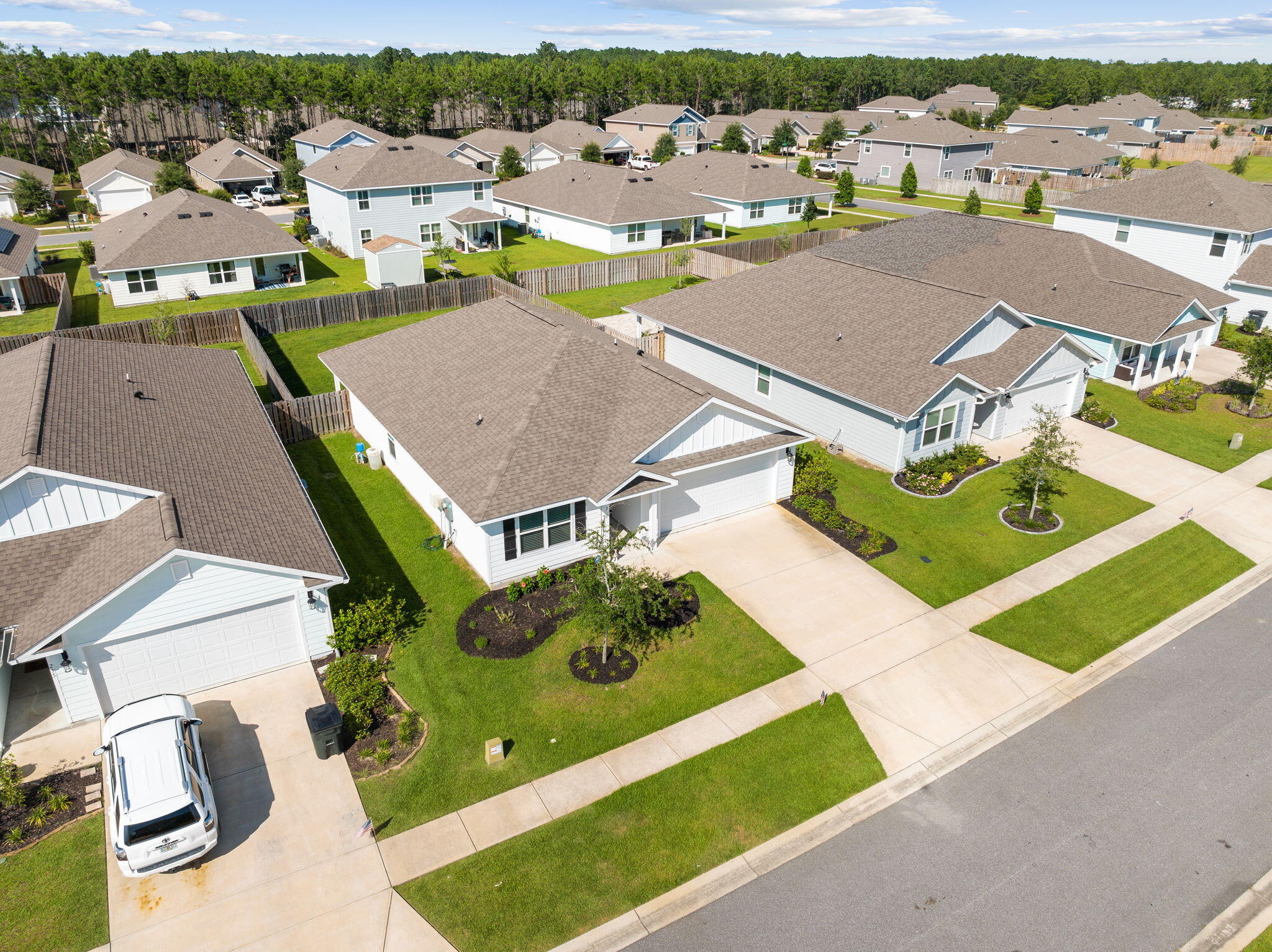 245 This Way Freeport, FL 32439 - Photo 32 of 46 an aerial view of a house with a garden