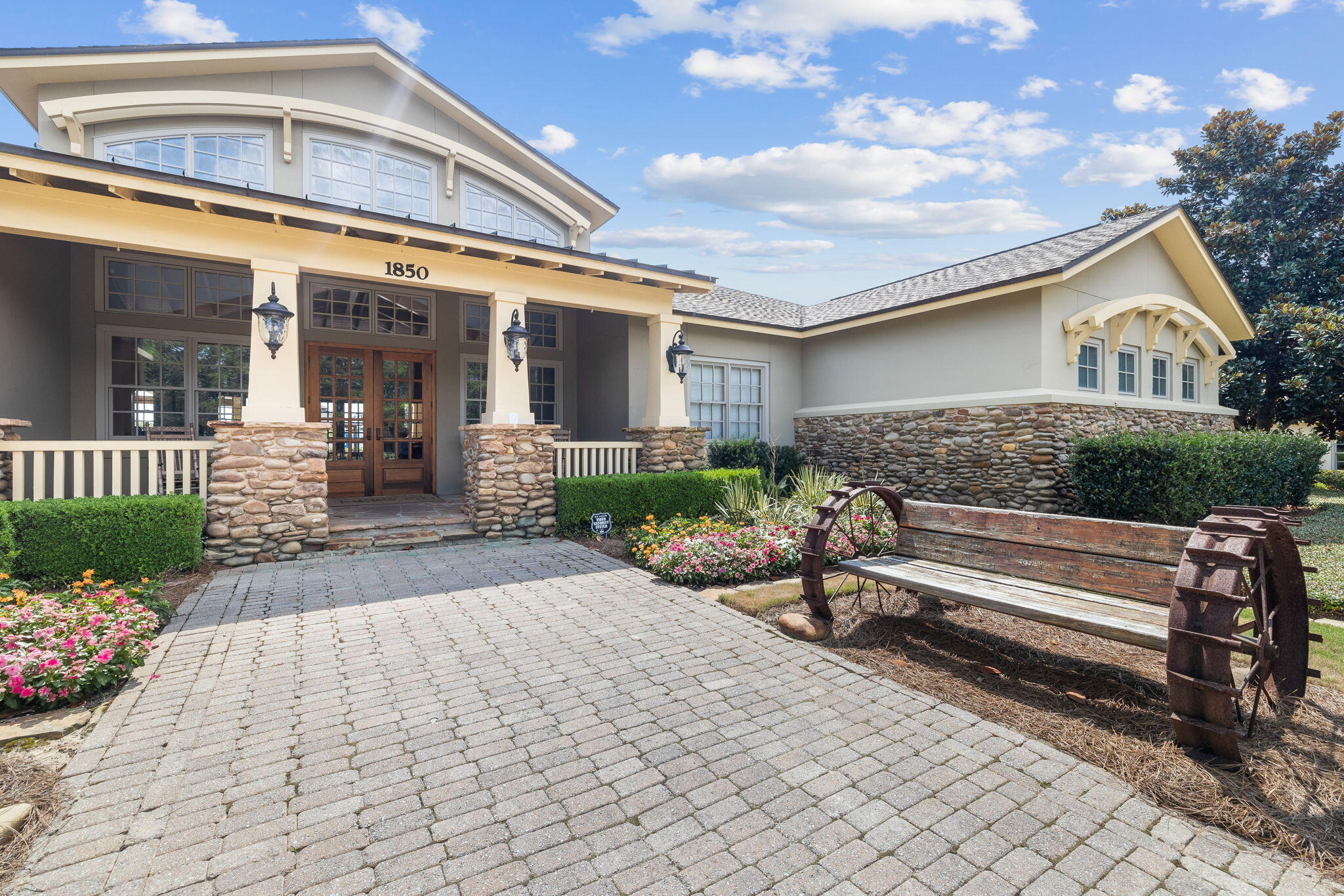 245 This Way Freeport, FL 32439 - Photo 42 of 46 a front view of a house with a garden and plants