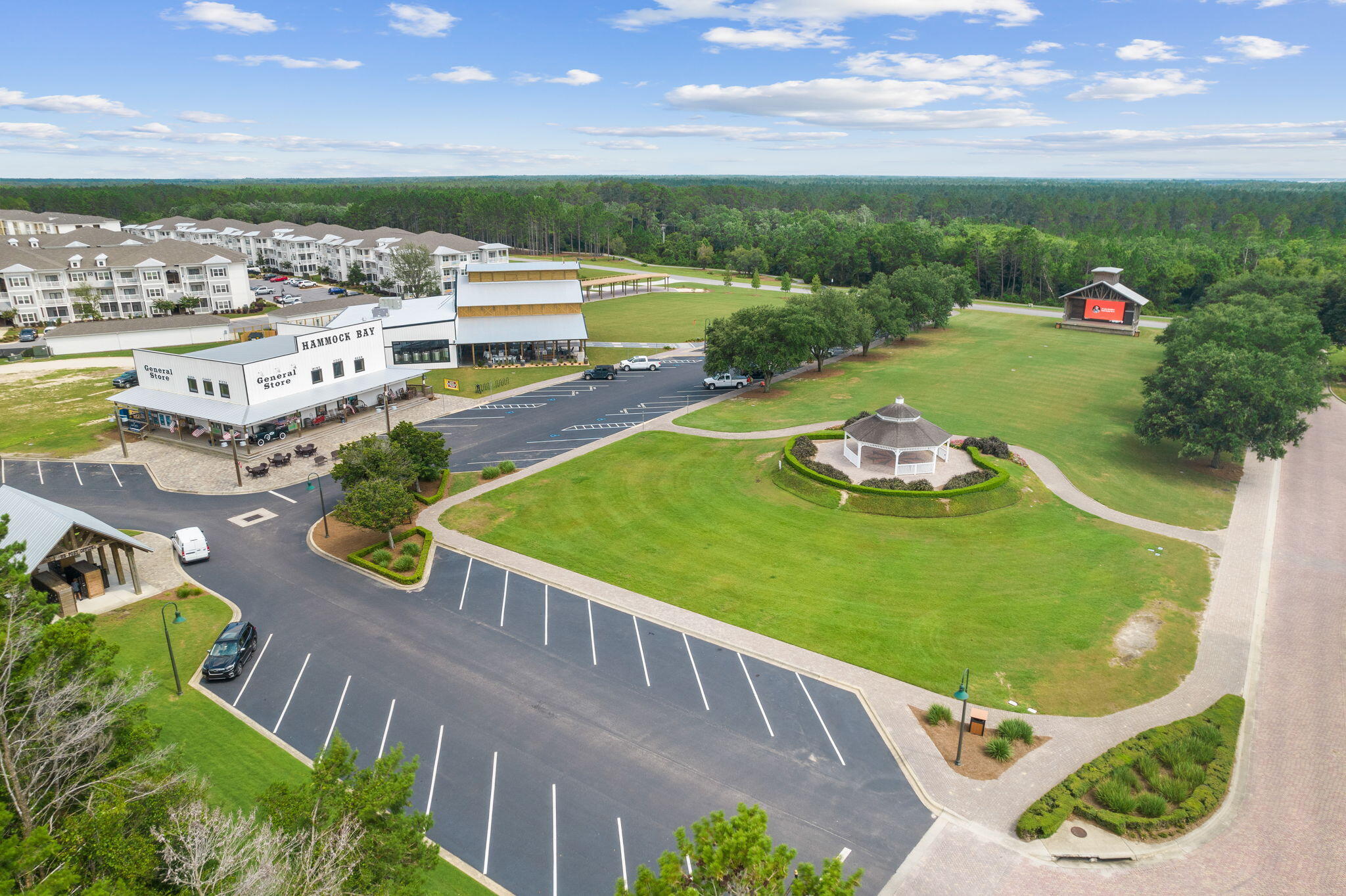 245 This Way Freeport, FL 32439 - Photo 45 of 46 an aerial view of a house with a garden and lake view