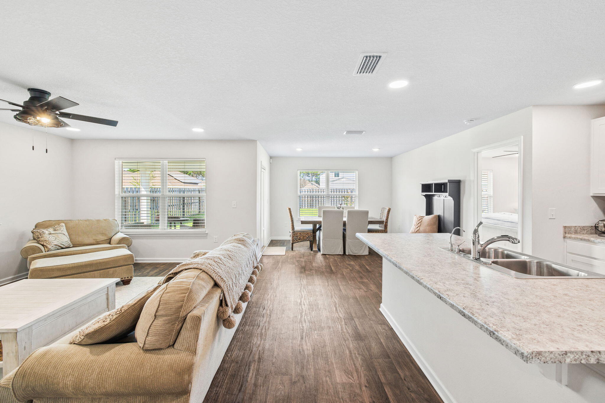 245 This Way Freeport, FL 32439 - Photo 10 of 46 a living room with furniture window and wooden floor