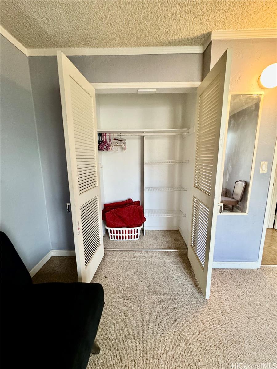 87-122 Helelua Street, Unit C201 Waianae, HI 96792 - Photo 15 of 19 a bathroom with a shower and a sink