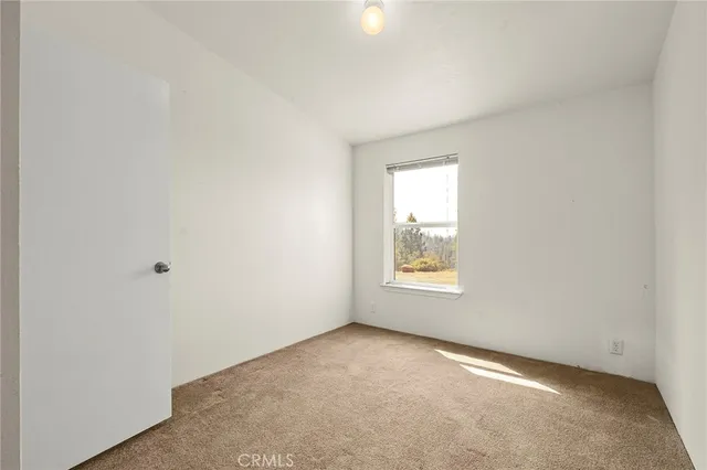 a view of hallway with closet
