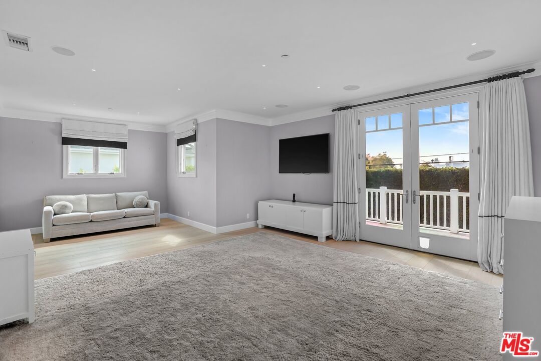 522 21st Street Santa Monica, CA 90402 - Photo 12 of 18 a view of a bedroom with furniture and windows