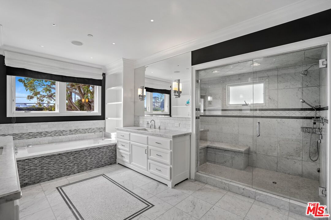 522 21st Street Santa Monica, CA 90402 - Photo 13 of 18 a spacious bathroom with double vanity and a shower