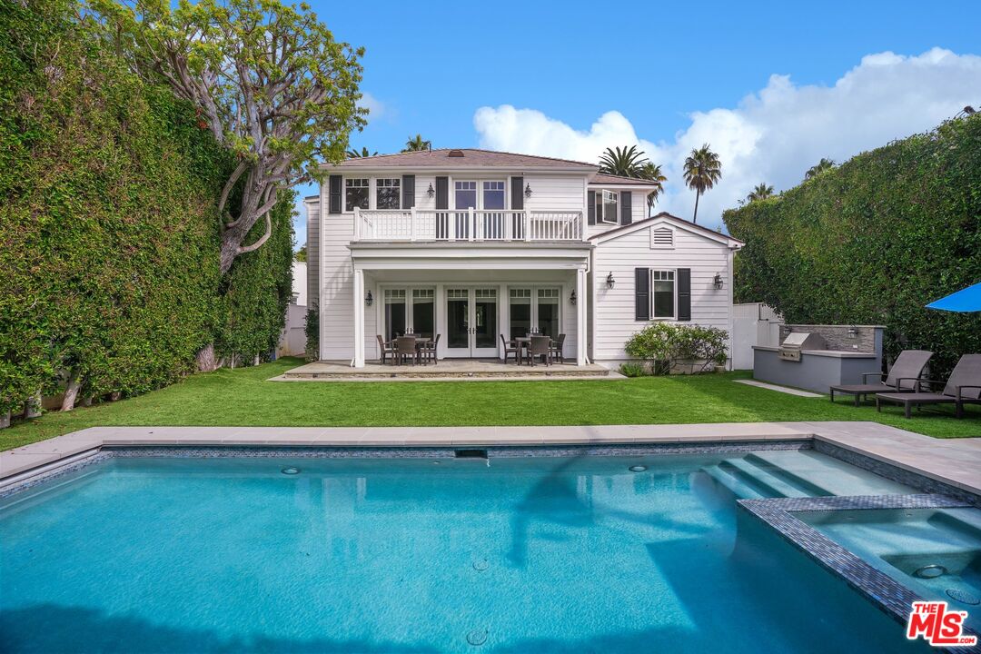 522 21st Street Santa Monica, CA 90402 - Photo 17 of 18 a view of a house with a swimming pool