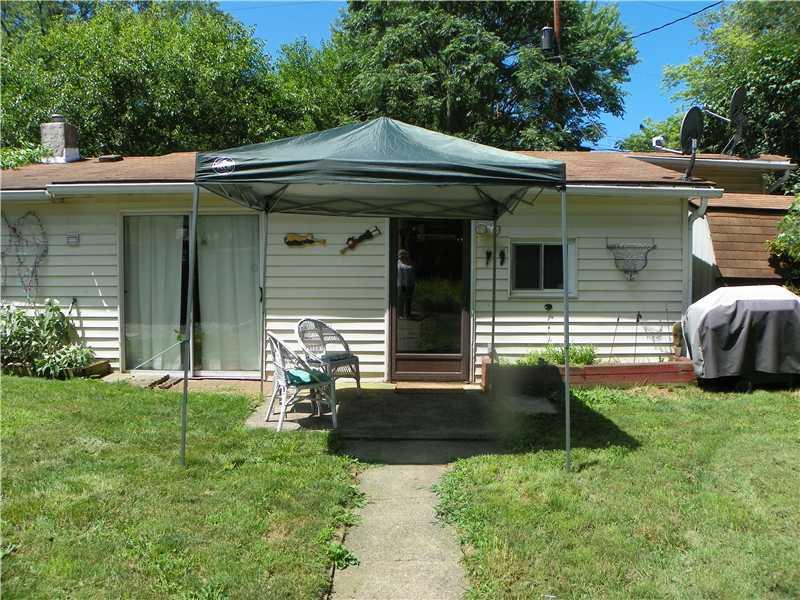 80 Werner Camp Road Pittsburgh, PA 15238 - Photo 2 of 9 Patio/Deck. Who would have guessed that there is a glass door off the dining room? or a door off the kitchen leading to a patio? Or a level fully fenced backyard? Well, certainly not I, nor you, either, because none of this is visible at all if you just drive by.