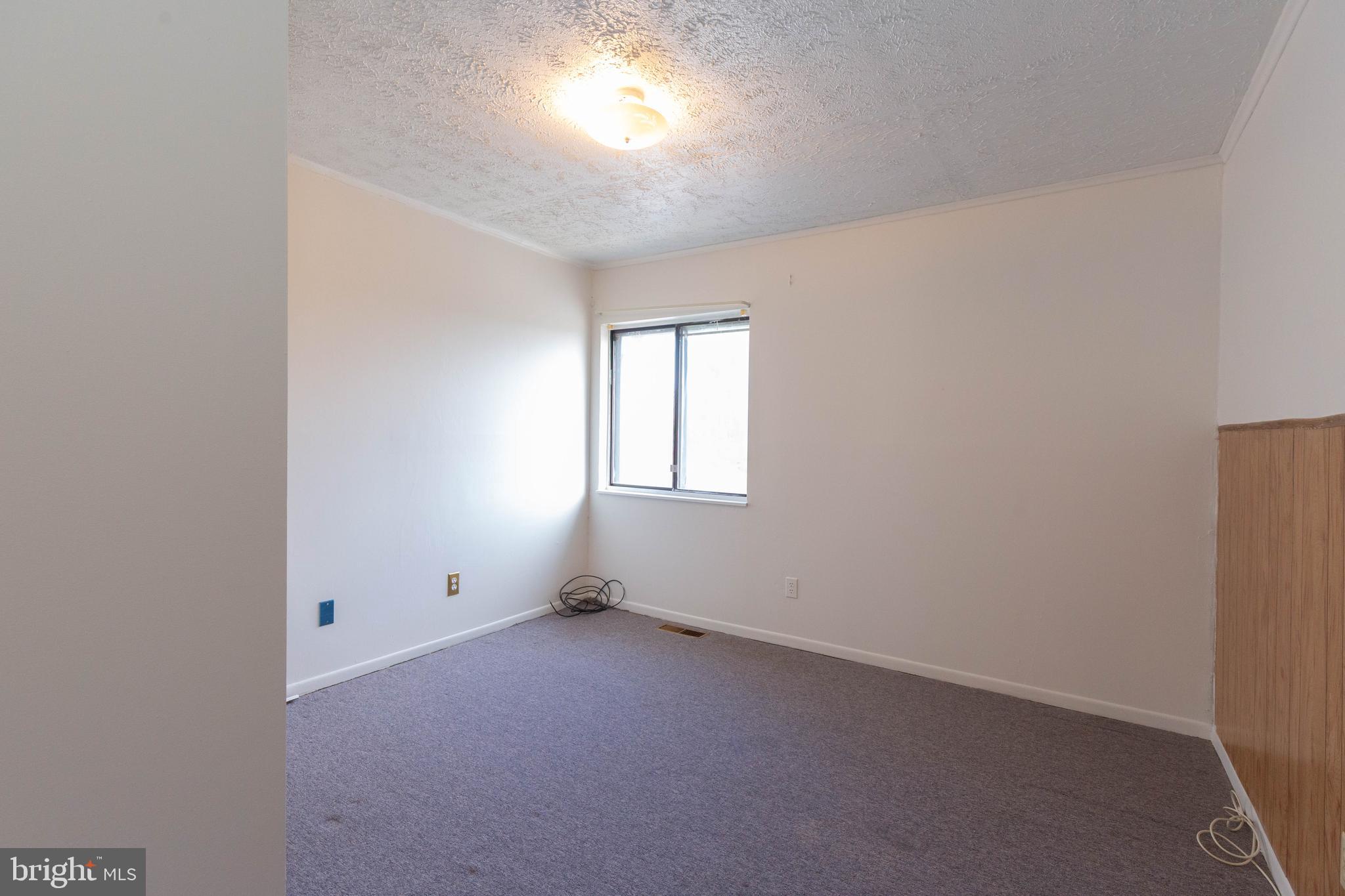 48 Turf Lane Ranson, WV 25438 - Photo 14 of 21 an empty room with a window
