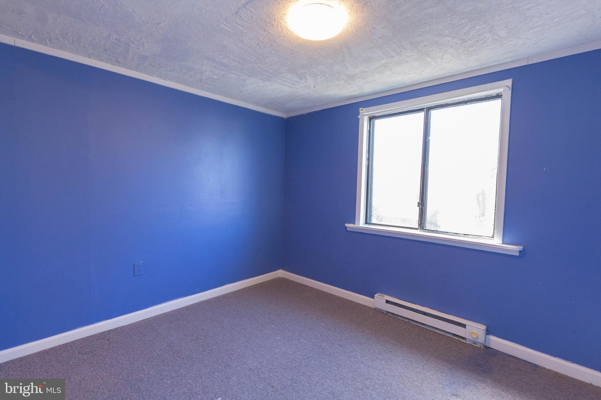 48 Turf Lane Ranson, WV 25438 - Photo 16 of 21 an empty room with a window