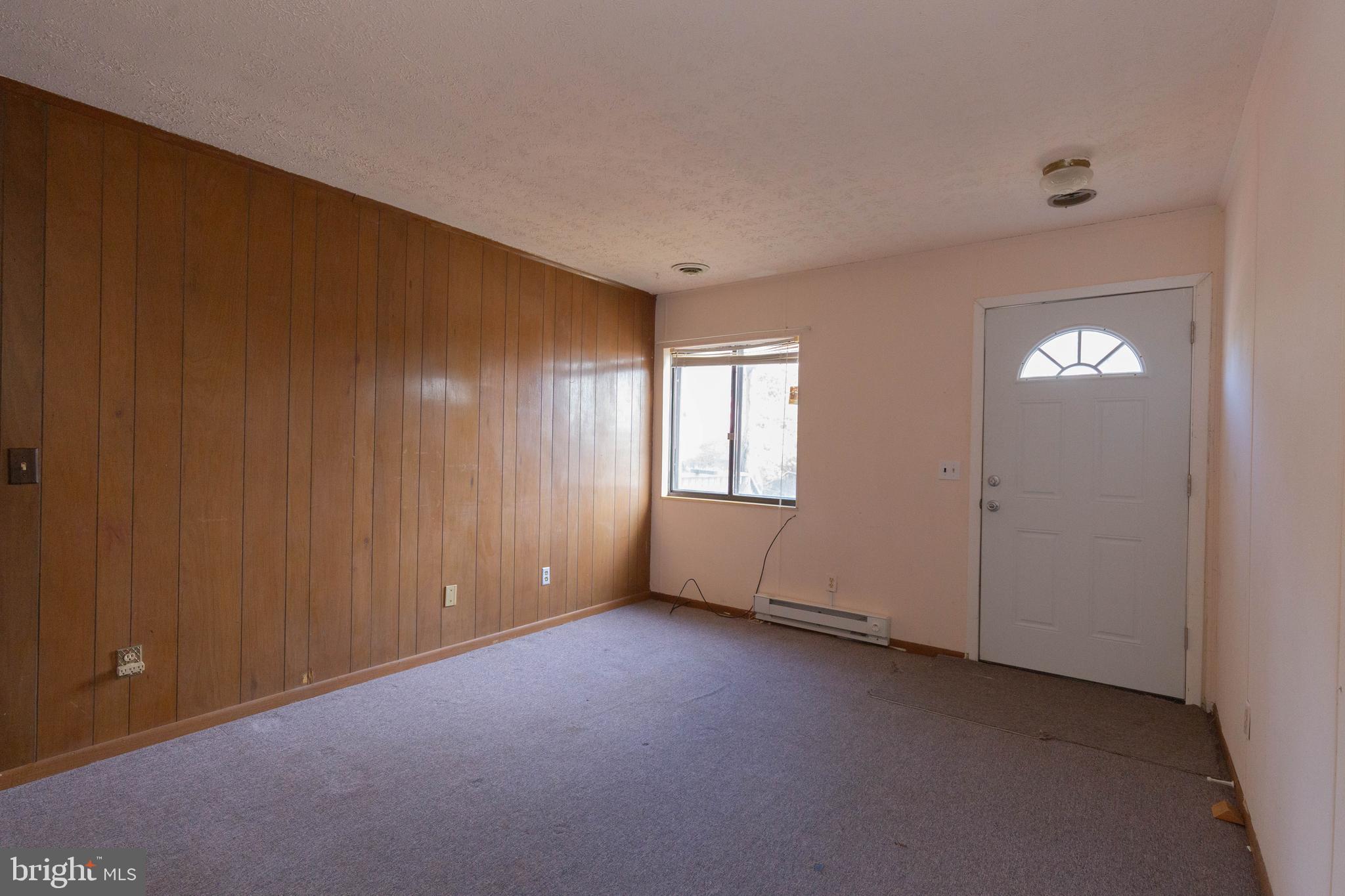 48 Turf Lane Ranson, WV 25438 - Photo 2 of 21 a view of an empty room with a window