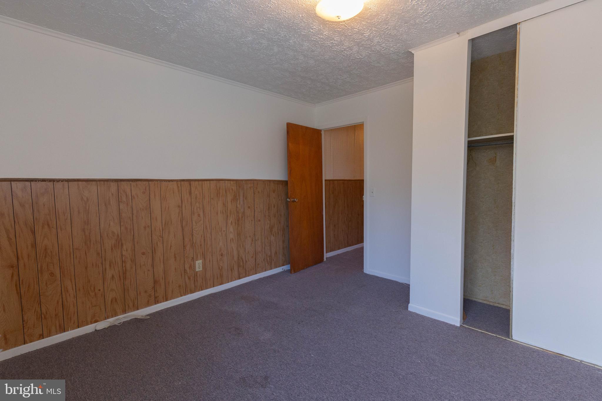 48 Turf Lane Ranson, WV 25438 - Photo 4 of 21 a view of an empty room with closet area